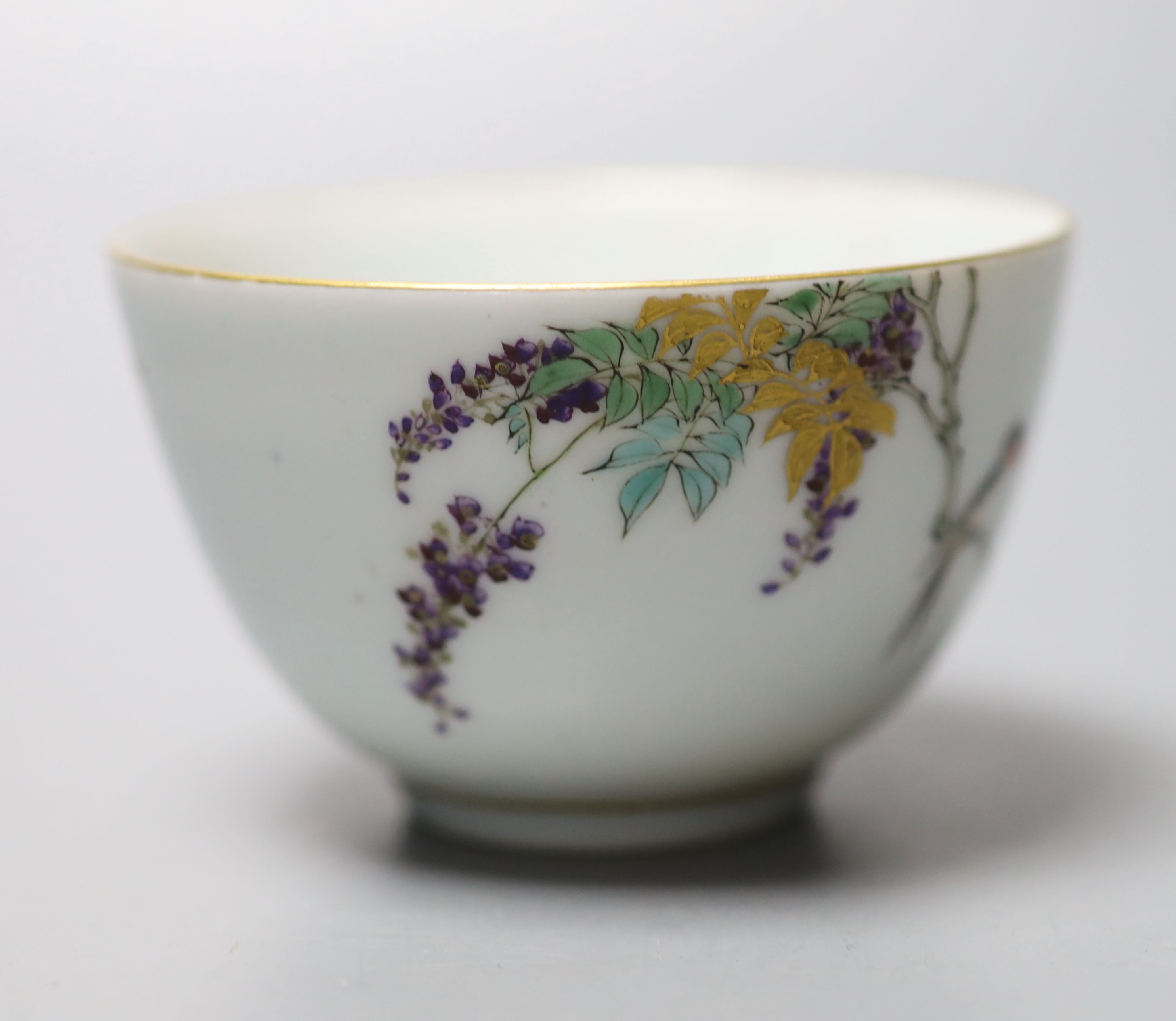 An unusual Japanese Kinkozan porcelain tea bowl, six character mark to base, Dia 8cm